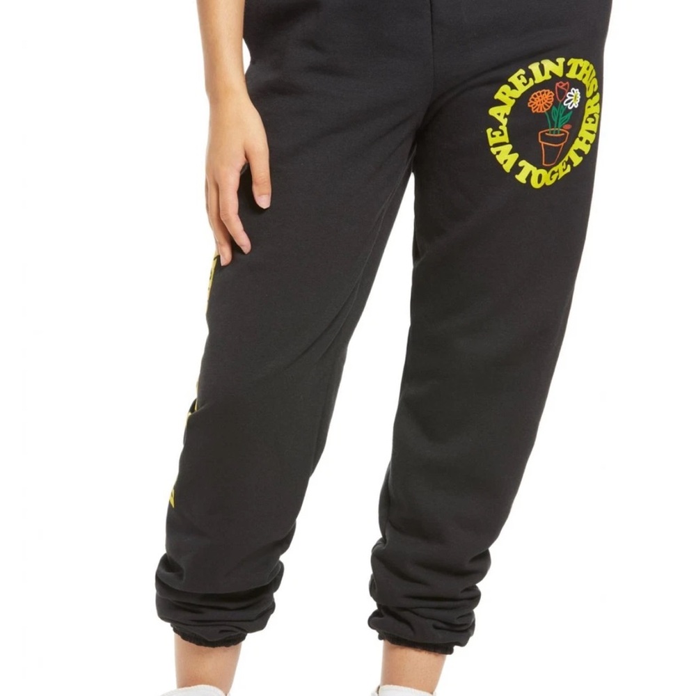 Petals and Peacock black Joggers with Yellow Graphic